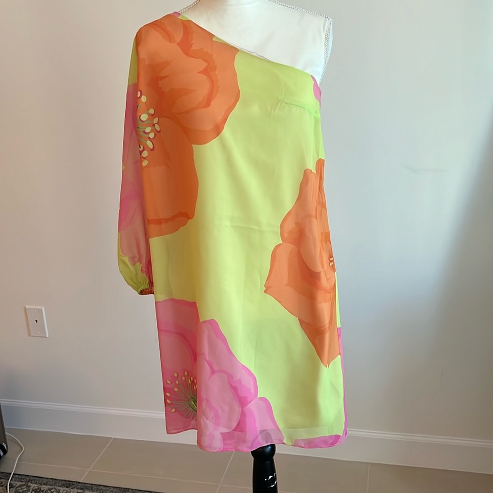 Chiffon, floral, one side off shoulder with long  sleeve. Unworn with tags.